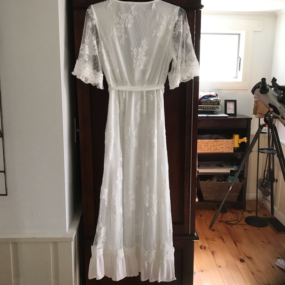 Lulu’s white lace, sheath wrap dress, flutter sleeve.